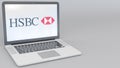 Opening and closing laptop with HSBC logo on the screen. Computer technology conceptual editorial 4K clip