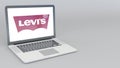 Opening and closing laptop with Levi Strauss Co logo. 4K editorial animation