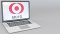 Opening and closing laptop with MUFG logo on the screen. Computer technology conceptual editorial 4K clip