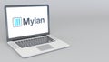 Opening and closing laptop with Mylan logo. 4K editorial 3D rendering Royalty Free Stock Photo