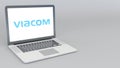 Opening and closing laptop with Viacom logo. 4K editorial animation