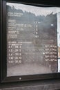 Opening hours and admission fees board outside Vianden Castle, Luxembourg Royalty Free Stock Photo