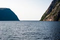 Opening from inland fjord between steep cliffs