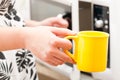 Opening the microwave oven Royalty Free Stock Photo