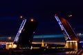 Opening of Palace drawbridge. Night view of Palace bridge from the Neva river in Saint Petersburg, Russia Royalty Free Stock Photo