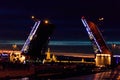 Opening of Palace drawbridge. Night view of Palace bridge from the Neva river in Saint Petersburg, Russia Royalty Free Stock Photo