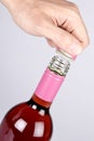Opening a Screwcap on a Bottle of RosÃÂ© Wine Royalty Free Stock Photo