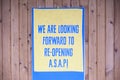 Opening soon sign but currently closed due to covid-19 Royalty Free Stock Photo