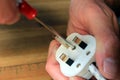 Opening a UK 13 amp plug to change the fuse Royalty Free Stock Photo