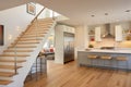 openspace saltbox home interior with floating staircase