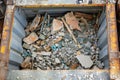 opentop steel dumpster filled with demolition debris Royalty Free Stock Photo