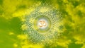 Openwork mandala against the sky in a yellow and green tonality. Video.