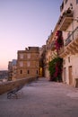 The openwork metal benches on the waterfront of the Senglea, Malta