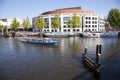 Opera house and boats in amstel river