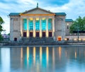 Poznan. Opera house and fountain in the park at sunset. Royalty Free Stock Photo