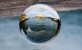 Opera house photography in clear crystal ball at sunset time. Royalty Free Stock Photo