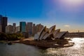 Opera House in Sydney, Australia, with the skyline in the back and a wonderful clear blue sky