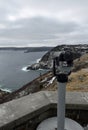 Operated binoculars overlooking the bay at Signal Hill