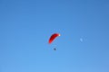 The operated  parachute flies in the blue sky Royalty Free Stock Photo