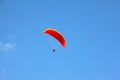 The operated red parachute flies in high Royalty Free Stock Photo