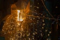 Operater tapping molten metal Royalty Free Stock Photo