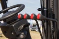 Operating control panels or levers and steering wheel in forklift Royalty Free Stock Photo