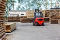 Operating Forklift Truck In Lumber Industry Royalty Free Stock Photo