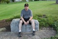 Operation Iraqi Freedom Veteran sitting on a rock Royalty Free Stock Photo