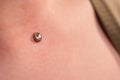 Operation to install microdermal piercing. Professional placing Royalty Free Stock Photo