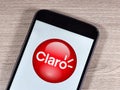 operator Claro logo on the smartphone screen. Claro is a concessionaire of mobile telephony