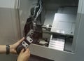 Operator of cnc change the parameters of machine-tool Royalty Free Stock Photo