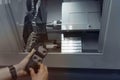 Operator of cnc change the parameters of machine-tool Royalty Free Stock Photo