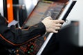 Operator working with touch screen control panel
