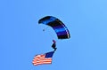 Hang gliding with the American flag Royalty Free Stock Photo