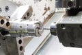 Operator machining die casting machine parts