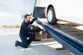 Operator raising the tow truck platform