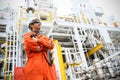 Operator recording operation of oil and gas process at oil and rig plant, offshore oil and gas industry, offshore oil and rig