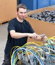 Operator repairs a machine in an industrial plant with tools - p Royalty Free Stock Photo