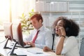 Operator woman agent with headsets working in a call centre Royalty Free Stock Photo