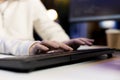 Close up shot of system engineer in apartment writing lines of code