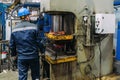 Operator working with hydraulic press Royalty Free Stock Photo