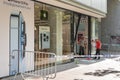 Operators cleaning damage caused by attempted robbery in Apple store at Sabadell city center