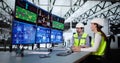 Operators and engineers monitor SCADA system using control in factory Royalty Free Stock Photo