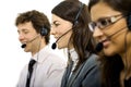 Operators taliking on headset Royalty Free Stock Photo