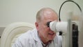 Ophtalmologist Examines and Talkes to the Patient