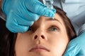 An ophthalmologist injects drops into the eyes of patients in an ophthalmic clinic. Health, vision, eye disease