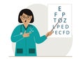 Ophthalmologist near the vision test table. Diagnosis and eye examination. Optometrist checks eyesight and chooses Royalty Free Stock Photo