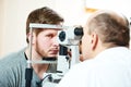 Ophthalmologist or optometrist optician at work Royalty Free Stock Photo