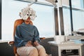 Ophthalmologist phoropter, patient consulting or eye exam for vision, healthcare or wellness. Black woman, ophthalmology Royalty Free Stock Photo