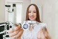 ophthalmologist with trial frame for selection of glasses. selective focus Royalty Free Stock Photo